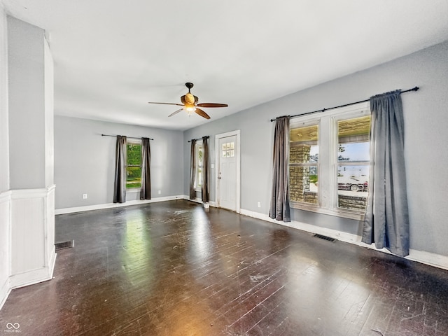 145 S 7th Ave, Beech Grove, IN 46107 - empty room featuring a ceiling fan, wood-type flooring, and baseboards