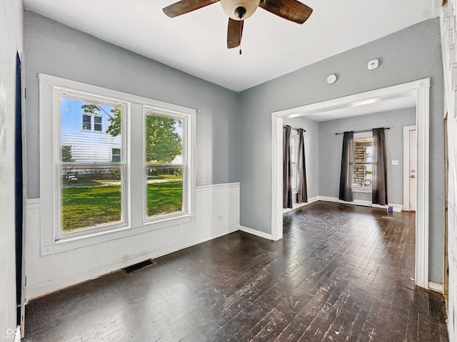 145 S 7th Ave, Beech Grove, IN 46107 - empty room featuring wood-type flooring, ceiling fan, a smoke detector, and baseboards