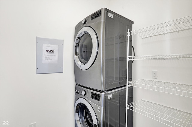 727 N Illinois St Unit 202, Indianapolis, IN 46204 - laundry room featuring estacked washer and dryer