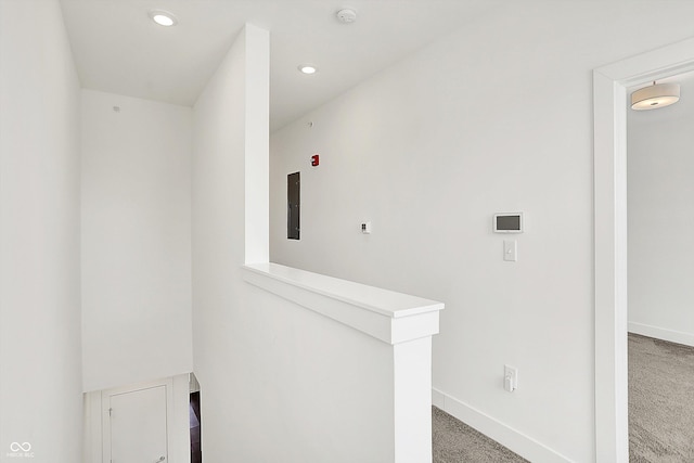 727 N Illinois St Unit 202, Indianapolis, IN 46204 - hall featuring baseboards, light colored carpet, recessed lighting, and an upstairs landing