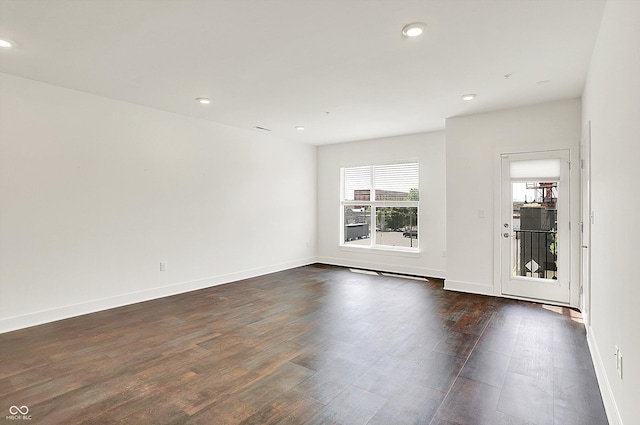 727 N Illinois St Unit 202, Indianapolis, IN 46204 - spare room with recessed lighting, dark wood-type flooring, and baseboards