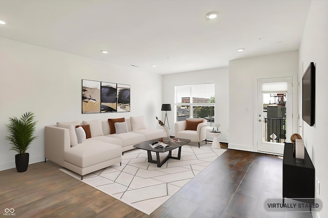 727 N Illinois St Unit 202, Indianapolis, IN 46204 - living room featuring wood finished floors, recessed lighting, and baseboards