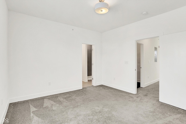 727 N Illinois St Unit 202, Indianapolis, IN 46204 - unfurnished room featuring carpet floors and baseboards