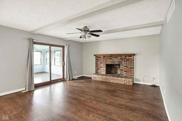 6838 Five Points Rd, Indianapolis, IN 46259 - unfurnished living room featuring beam ceiling, a textured ceiling, baseboards, wood finished floors, and ceiling fan