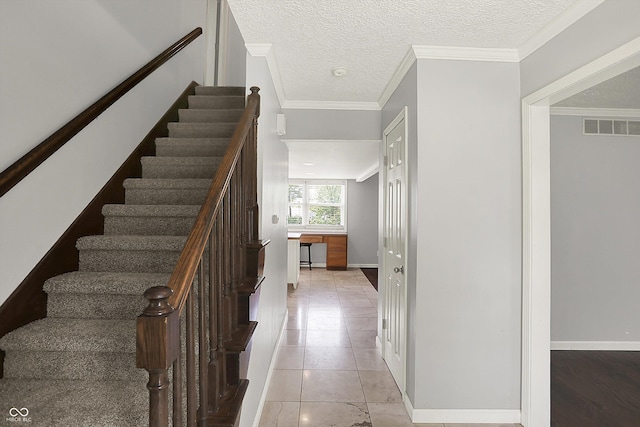 6838 Five Points Rd, Indianapolis, IN 46259 - stairs featuring a textured ceiling, baseboards, and tile patterned flooring