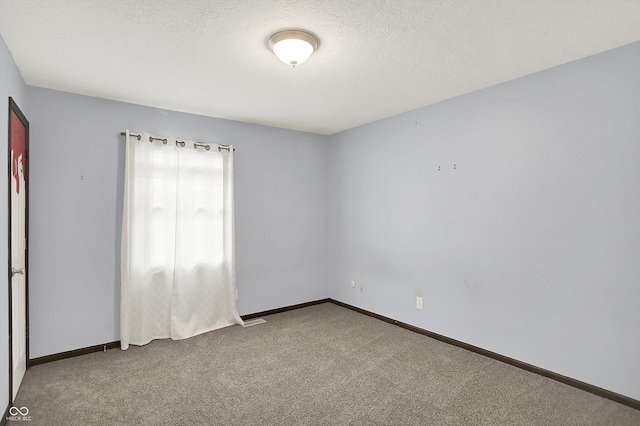 6838 Five Points Rd, Indianapolis, IN 46259 - carpeted spare room featuring baseboards and a textured ceiling