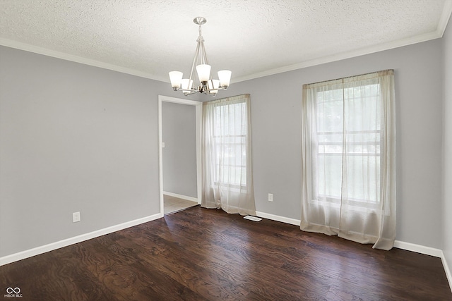 6838 Five Points Rd, Indianapolis, IN 46259 - empty room with a chandelier, dark wood-type flooring, ornamental molding, a textured ceiling, and baseboards