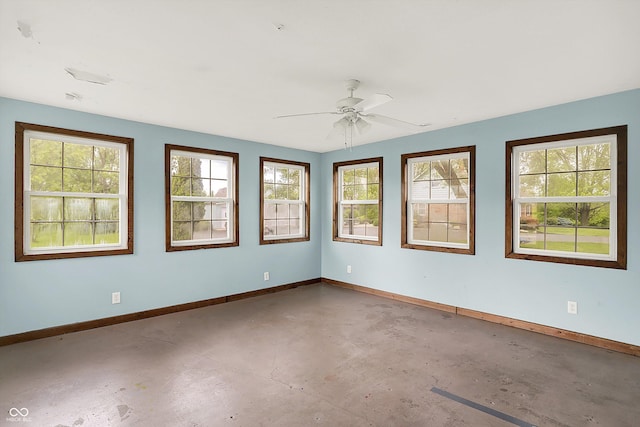 6838 Five Points Rd, Indianapolis, IN 46259 - spare room featuring concrete flooring, plenty of natural light, and baseboards