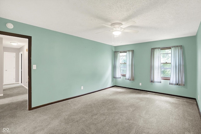 6838 Five Points Rd, Indianapolis, IN 46259 - empty room with carpet flooring, a ceiling fan, baseboards, a smoke detector, and a textured ceiling