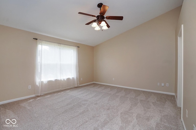6105 Franklin Villas Way, Indianapolis, IN 46237 - empty room featuring lofted ceiling, a ceiling fan, light colored carpet, and baseboards