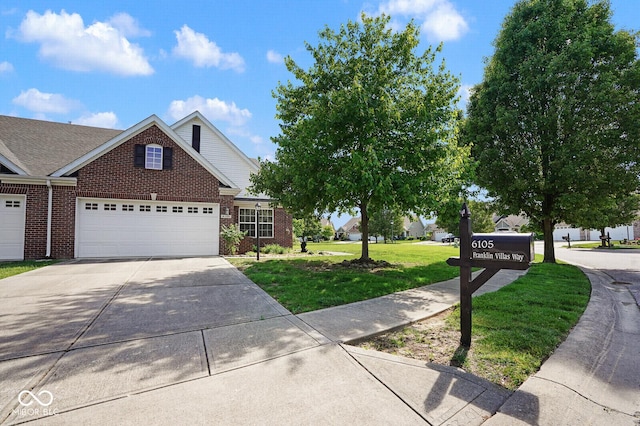 6105 Franklin Villas Way, Indianapolis, IN 46237 - view of front of house with brick siding, driveway, a front yard, and a garage