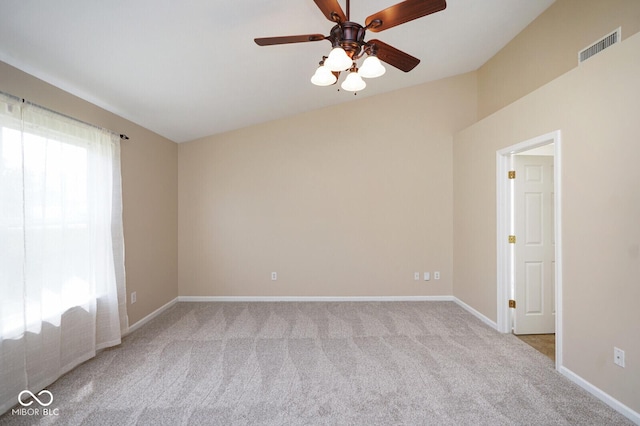 6105 Franklin Villas Way, Indianapolis, IN 46237 - empty room with carpet flooring, a ceiling fan, vaulted ceiling, and baseboards