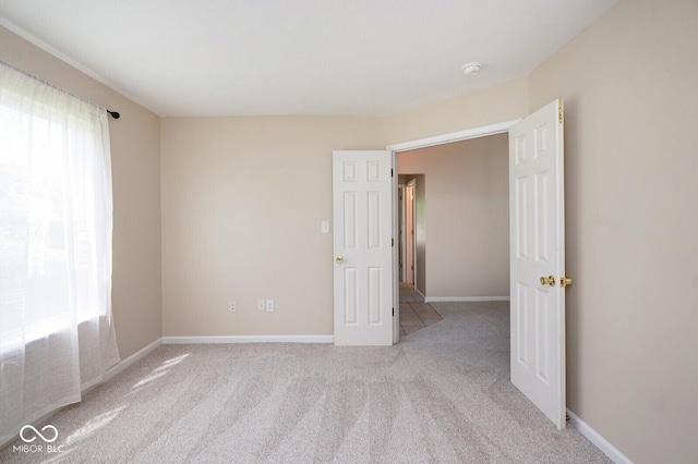6105 Franklin Villas Way, Indianapolis, IN 46237 - unfurnished room featuring healthy amount of natural light, carpet flooring, and a smoke detector