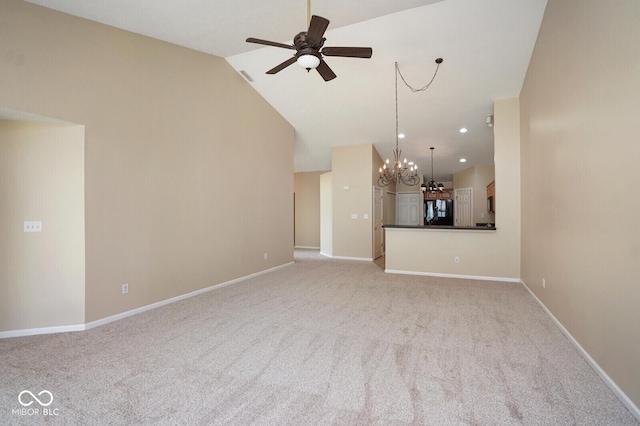 6105 Franklin Villas Way, Indianapolis, IN 46237 - unfurnished living room with a chandelier, carpet, a ceiling fan, lofted ceiling, and recessed lighting