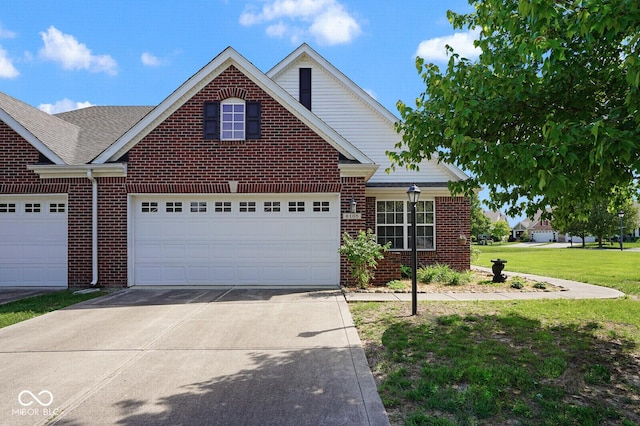 6105 Franklin Villas Way, Indianapolis, IN 46237 - traditional-style house featuring concrete driveway, brick siding, a front yard, and an attached garage