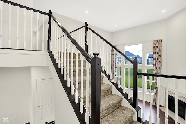 7046 Allegiance Ct, Indianapolis, IN 46259 - staircase with recessed lighting and wood finished floors