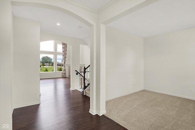 7046 Allegiance Ct, Indianapolis, IN 46259 - corridor featuring arched walkways, baseboards, dark wood finished floors, ornamental molding, and recessed lighting