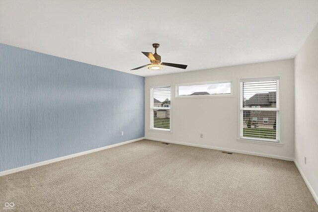 7046 Allegiance Ct, Indianapolis, IN 46259 - empty room with a ceiling fan, carpet, and baseboards