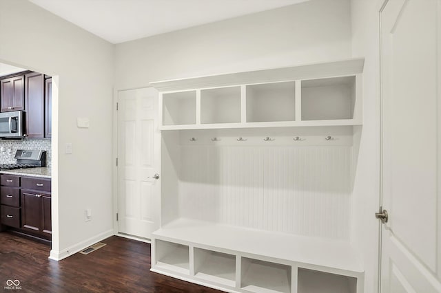 7046 Allegiance Ct, Indianapolis, IN 46259 - mudroom with dark wood-style flooring and baseboards