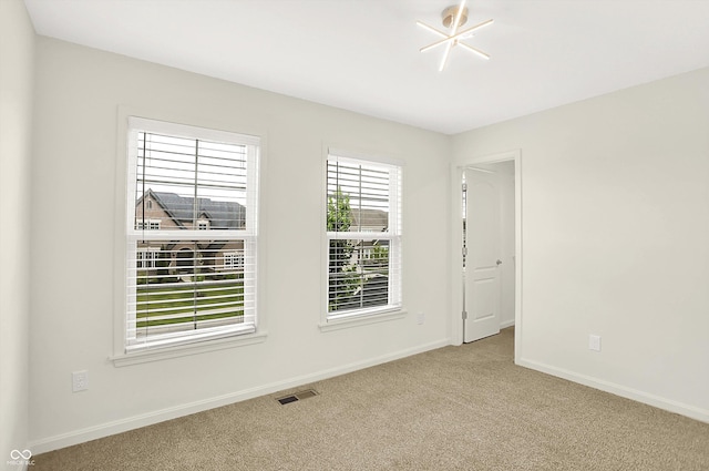 7046 Allegiance Ct, Indianapolis, IN 46259 - empty room featuring carpet and baseboards
