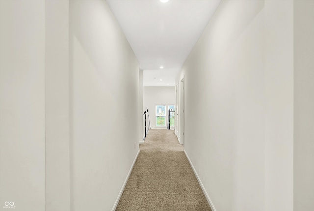 7046 Allegiance Ct, Indianapolis, IN 46259 - hall featuring light colored carpet, baseboards, and recessed lighting