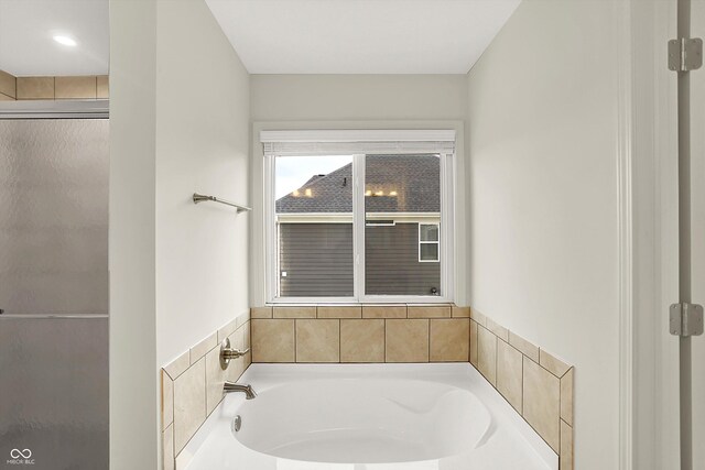 7046 Allegiance Ct, Indianapolis, IN 46259 - full bath with a stall shower and a bath