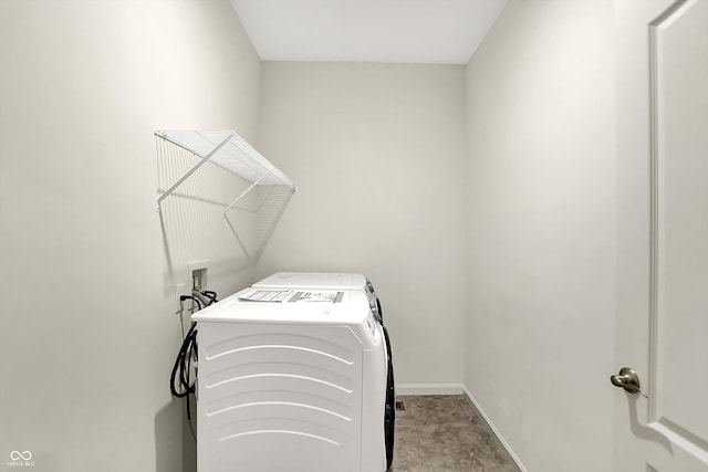 7046 Allegiance Ct, Indianapolis, IN 46259 - washroom featuring washing machine and dryer and baseboards