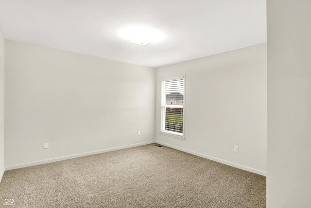 7046 Allegiance Ct, Indianapolis, IN 46259 - empty room with light colored carpet and baseboards
