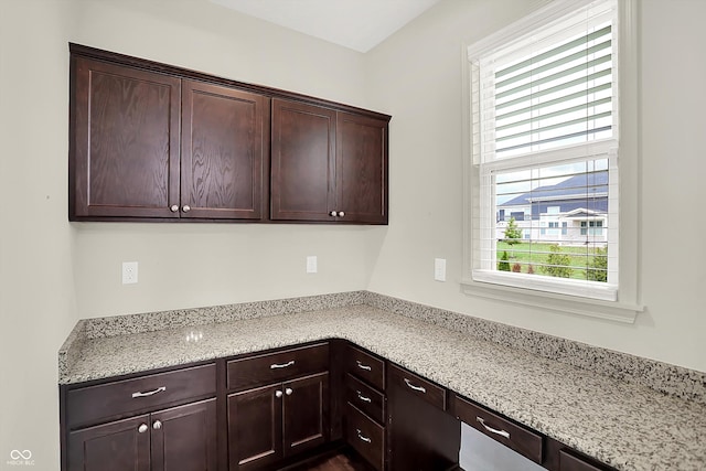 7046 Allegiance Ct, Indianapolis, IN 46259 - kitchen with dark brown cabinetry and light stone countertops