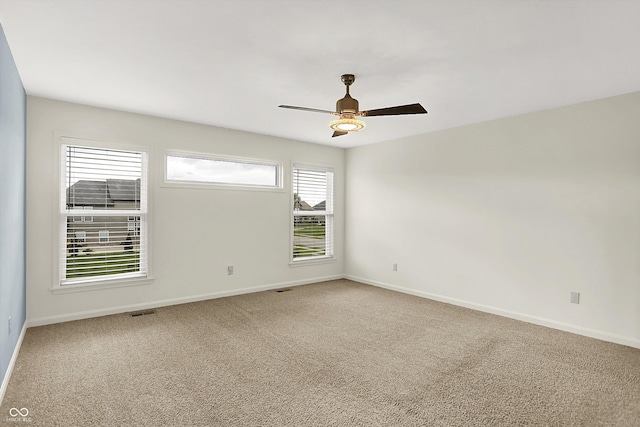 7046 Allegiance Ct, Indianapolis, IN 46259 - carpeted spare room with baseboards and ceiling fan