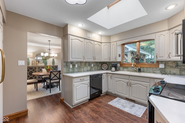 2411 N County Road 500 W, Muncie, IN 47304 - kitchen with black appliances, dark wood finished floors, light countertops, a sink, and recessed lighting