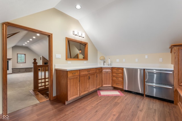 2411 N County Road 500 W, Muncie, IN 47304 - kitchen with lofted ceiling, refrigerator, stainless steel dishwasher, wood finished floors, and light countertops