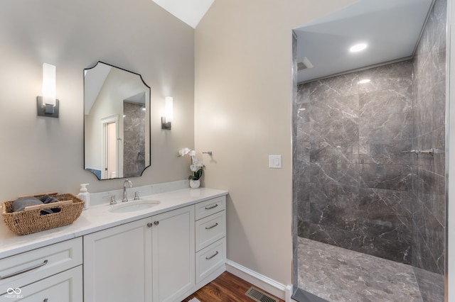 2411 N County Road 500 W, Muncie, IN 47304 - bathroom featuring walk in shower, vanity, wood finished floors, and baseboards