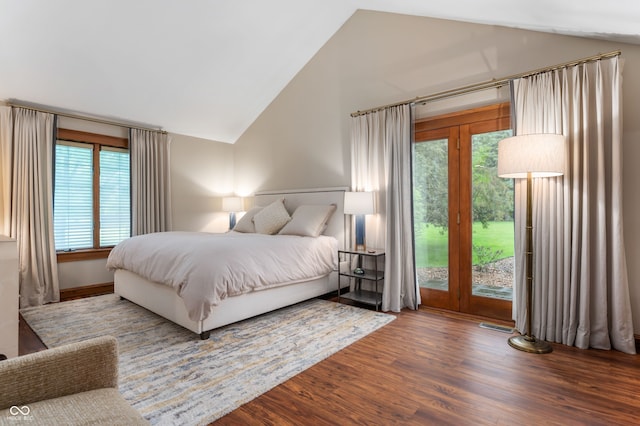2411 N County Road 500 W, Muncie, IN 47304 - bedroom featuring lofted ceiling, access to outside, multiple windows, and wood finished floors