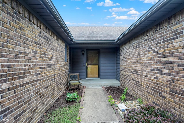 926 Brookside Ln, Plainfield, IN 46168 - view of exterior entry with roof with shingles and brick siding