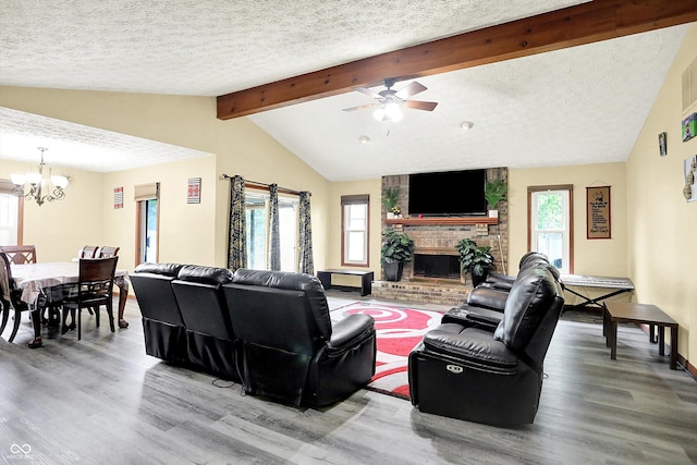 926 Brookside Ln, Plainfield, IN 46168 - living room with wood finished floors, a chandelier, plenty of natural light, and a textured ceiling