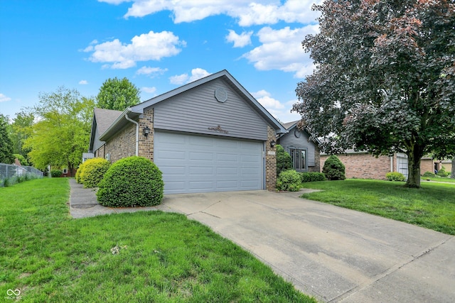 926 Brookside Ln, Plainfield, IN 46168 - view of front of house featuring concrete driveway, brick siding, a front lawn, and an attached garage