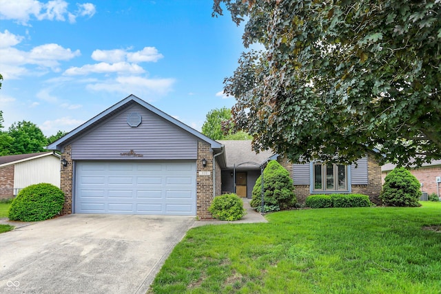 926 Brookside Ln, Plainfield, IN 46168 - view of front facade featuring brick siding, driveway, a front yard, and an attached garage