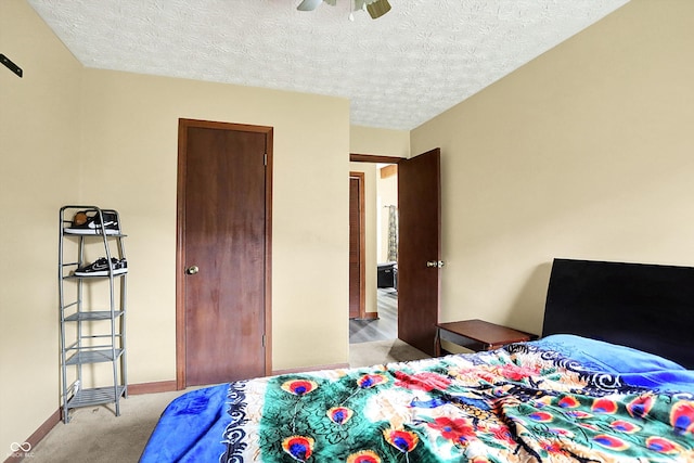 926 Brookside Ln, Plainfield, IN 46168 - bedroom featuring light colored carpet, baseboards, a textured ceiling, and a ceiling fan