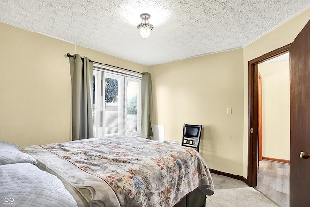 926 Brookside Ln, Plainfield, IN 46168 - bedroom featuring carpet flooring, baseboards, and a textured ceiling