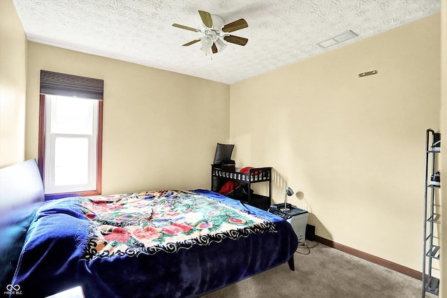 926 Brookside Ln, Plainfield, IN 46168 - carpeted bedroom with baseboards, a ceiling fan, and a textured ceiling