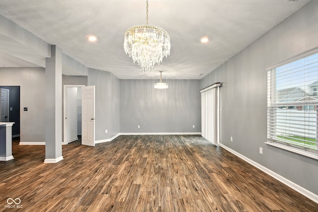 1454 Silver Pine Ln, Sheridan, IN 46069 - empty room featuring plenty of natural light, dark wood-style floors, a chandelier, and recessed lighting
