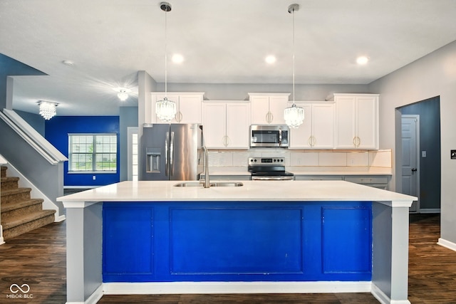 1454 Silver Pine Ln, Sheridan, IN 46069 - kitchen featuring stainless steel appliances, a sink, a kitchen island with sink, backsplash, and dark wood-type flooring