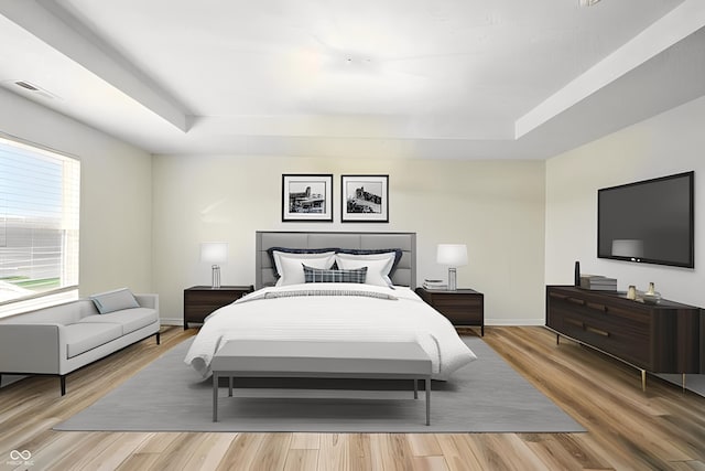 1454 Silver Pine Ln, Sheridan, IN 46069 - bedroom featuring a raised ceiling, light wood-style flooring, and baseboards