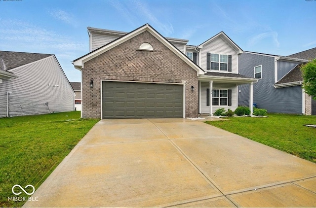 1454 Silver Pine Ln, Sheridan, IN 46069 - traditional-style home featuring a front yard, a garage, concrete driveway, and brick siding