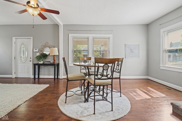1720 Woodlawn Ave, Indianapolis, IN 46203 - dining area with ceiling fan, baseboards, and wood finished floors