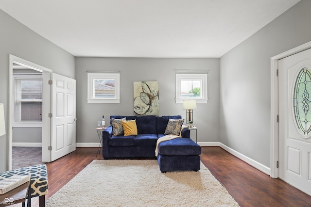 1720 Woodlawn Ave, Indianapolis, IN 46203 - living area with baseboards and dark wood finished floors