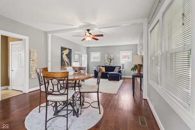 1720 Woodlawn Ave, Indianapolis, IN 46203 - dining room with a ceiling fan, wood finished floors, and baseboards