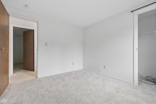 1826 Shorter Dr, Indianapolis, IN 46214 - unfurnished bedroom with carpet floors, baseboards, and a closet