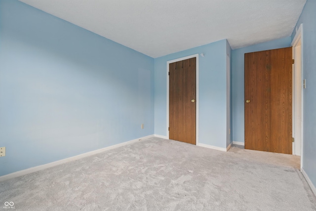 1826 Shorter Dr, Indianapolis, IN 46214 - unfurnished bedroom with carpet, baseboards, and a closet